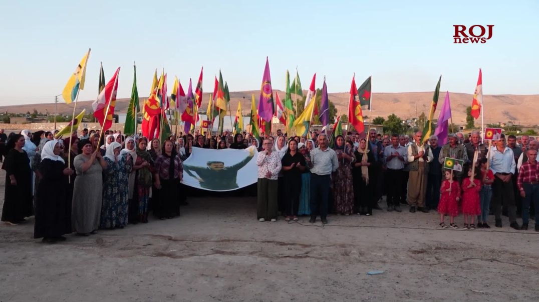Li Mexmûrê êrişên li ser Rojava bi meşek girseyî hatin şermezarkirin