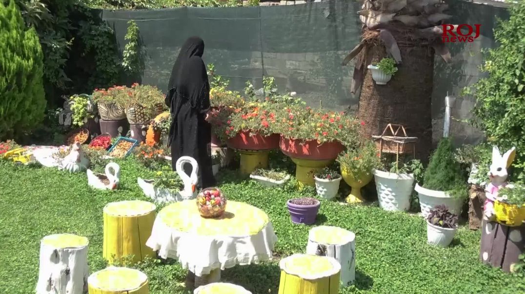 بەهێی دەستڕەنگین ماڵەکەی خۆی کردووە بە گوڵزار