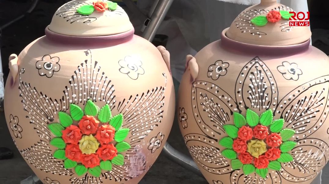 ژنێکی سلێمانی بە نەخشاندنی کەلوپەل جوانی بە ژیان بەخشیوە