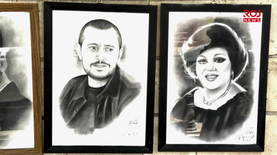 هونەرمەندێک لە دامێنی قەڵای هەولێردا بە وێنەکێشان ساتەکان تۆمار دەکات