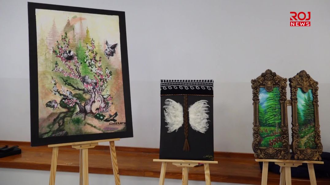 له‌ پێشانگایەک كه‌زى ژنانى شه‌ڕڤان وه‌ك سیبمولى به‌رخۆدان نیشان درا